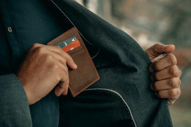 Man putting his wallet in his pocket